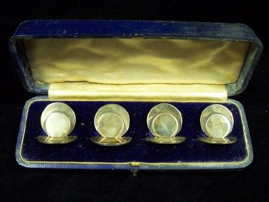 Appraisal: A cased set of four menu holders of circular form