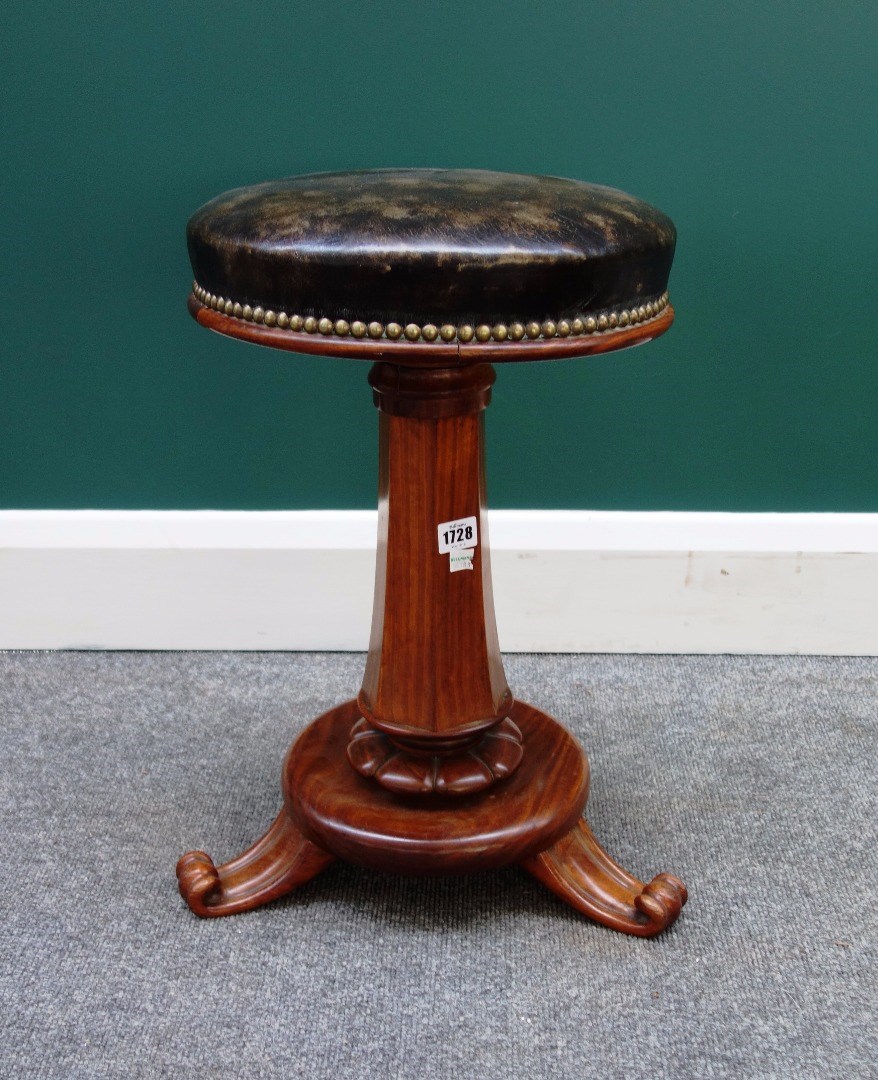 Appraisal: A William IV satinwood piano stool with height adjustable circular