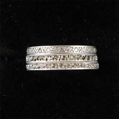 Appraisal: Two white gold full circle diamond set some missing eternity