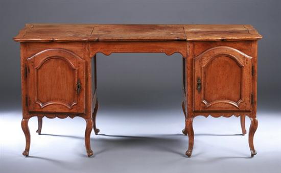 Appraisal: LOUIS XV PROVINCIAL FRUITWOOD POUDREUSE th century Shaped top with