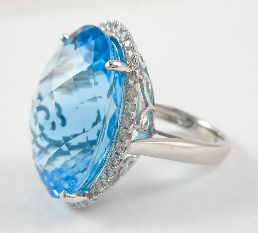 Appraisal: BLUE TOPAZ DIAMOND AND WHITE GOLD RING The k white