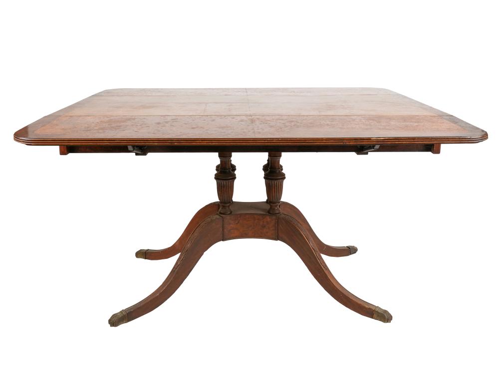 Appraisal: ANTIQUE REGENCY-STYLE WALNUT DROPLEAF TABLEhaving a drawer at each end