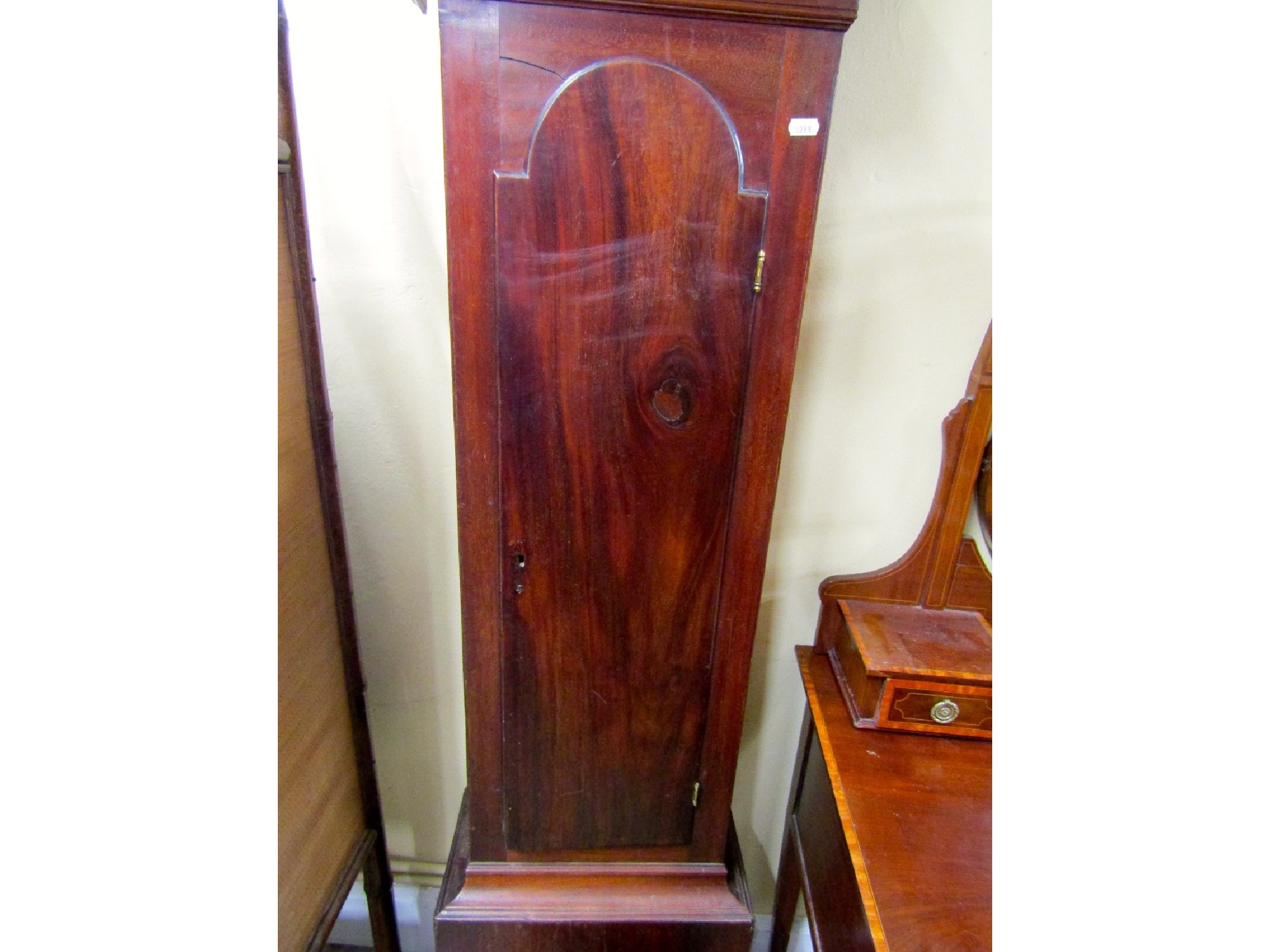 Appraisal: A Georgian mahogany longcase clock the trunk with full length