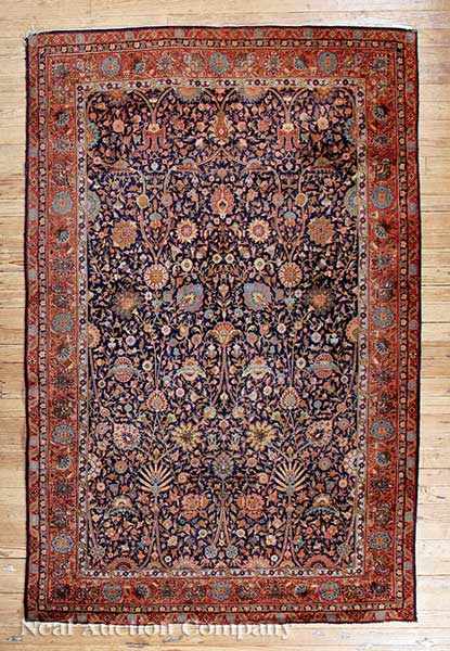 Appraisal: An Antique Oriental Rug navy and crimson ground overall stylized