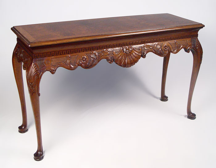 Appraisal: WELL MADE CARVED MAHOGANY SOFA TABLE Shell and floral carved