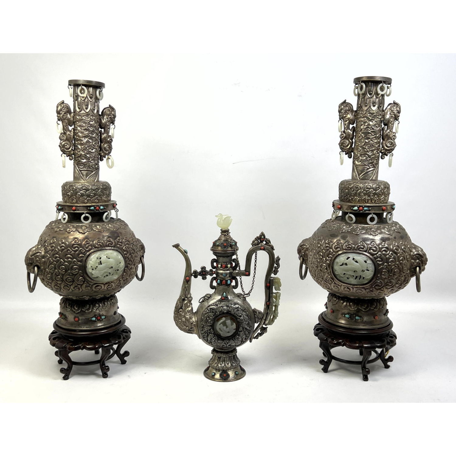 Appraisal: pc Tooled Silver Asian style Vessels Carved stone medallions and