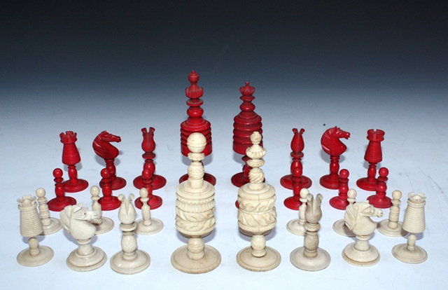 Appraisal: A TURNED AND STAINED BONE CHESS SET cm high with