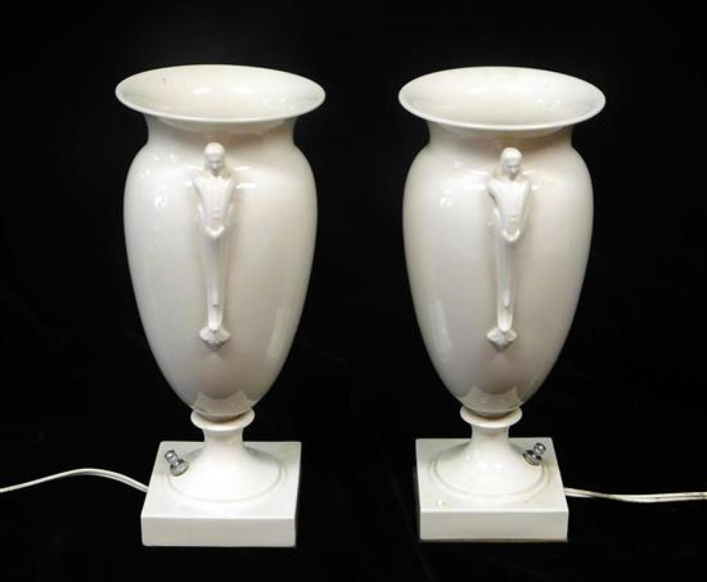 Appraisal: Pair of Deco style cream porcelain urn table lamps with