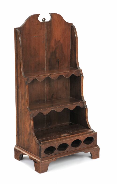 Appraisal: A miniature pine waterfall bookcase with three graduated shelves on