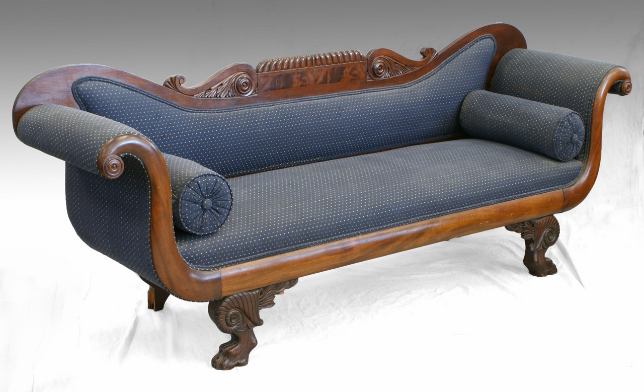 Appraisal: Carved mahogany Federal sofa with high scrolled ends raised on