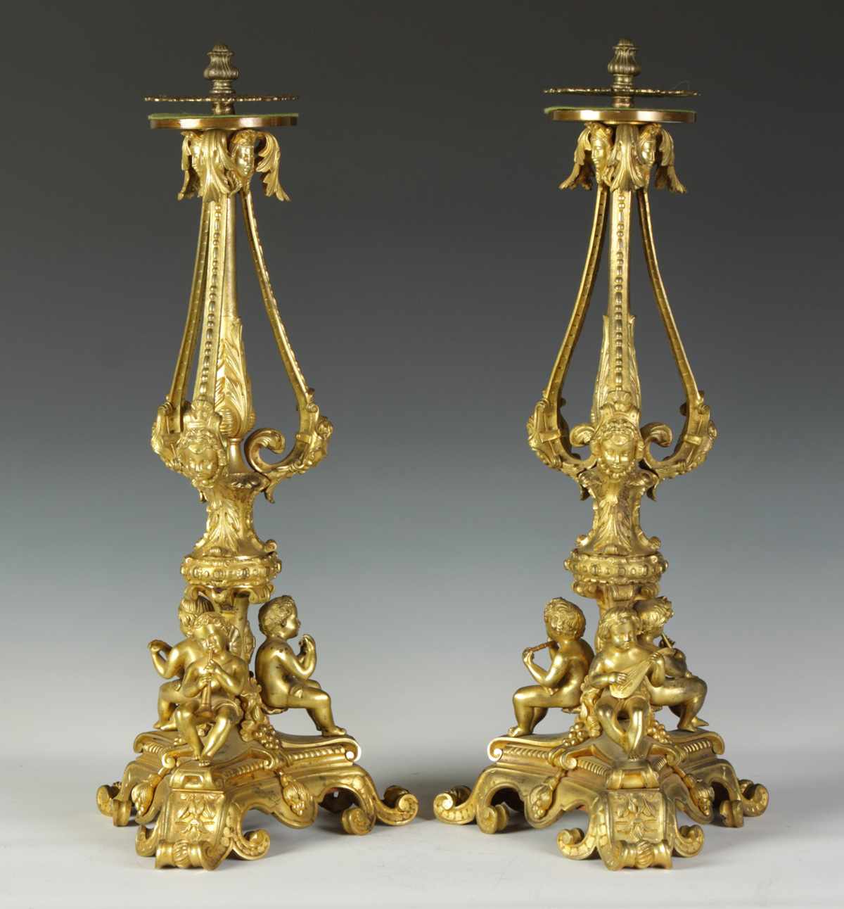 Appraisal: th Cent Gilt Bronze Candelabra Bases w cherubs playing musical