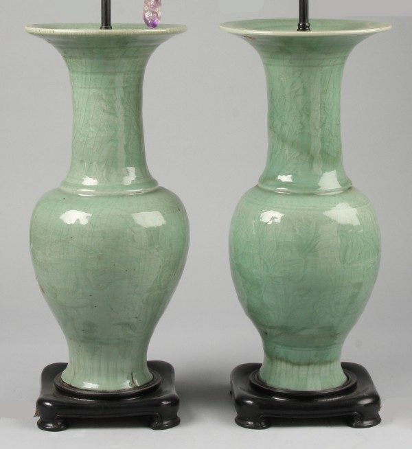 Appraisal: Complementing vases which have been converted into electrified lamps approximately