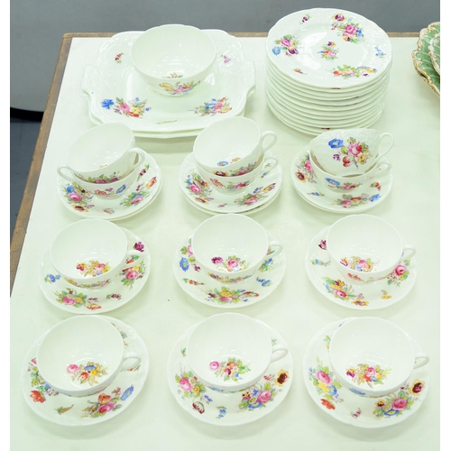 Appraisal: A Coalport moulded tea service c printed and painted with