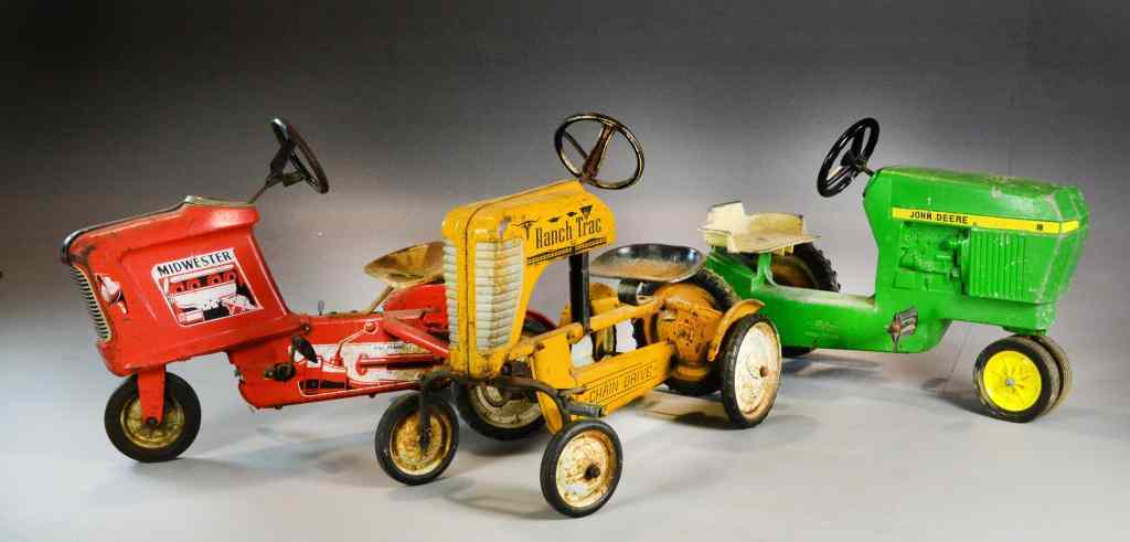 Appraisal: Antique Pedal Car TractorsTo include pedal car toy tractors a