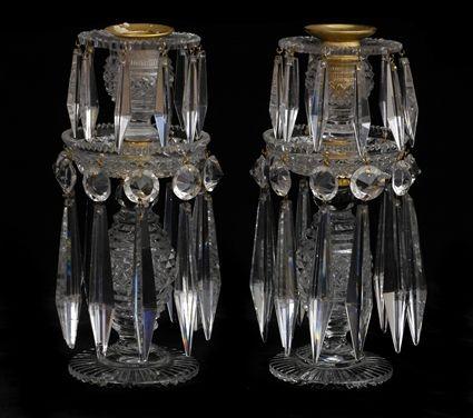 Appraisal: PAIR OF REGENCY CUT-GLASS CANDLESTICKS Each diamond-cut ovoid stem with