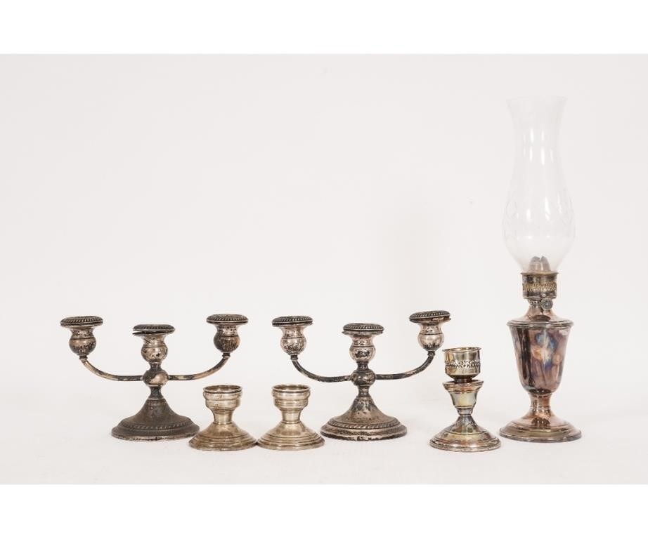 Appraisal: Weighted sterling silver to include an oil lamp candleabra and