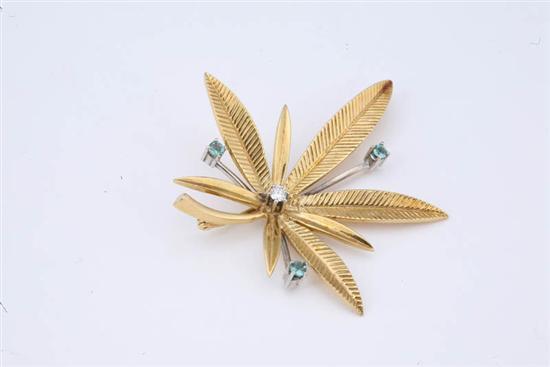 Appraisal: DIAMOND AND AQUAMARINE PIN Leaf pin resembles a buckeye and