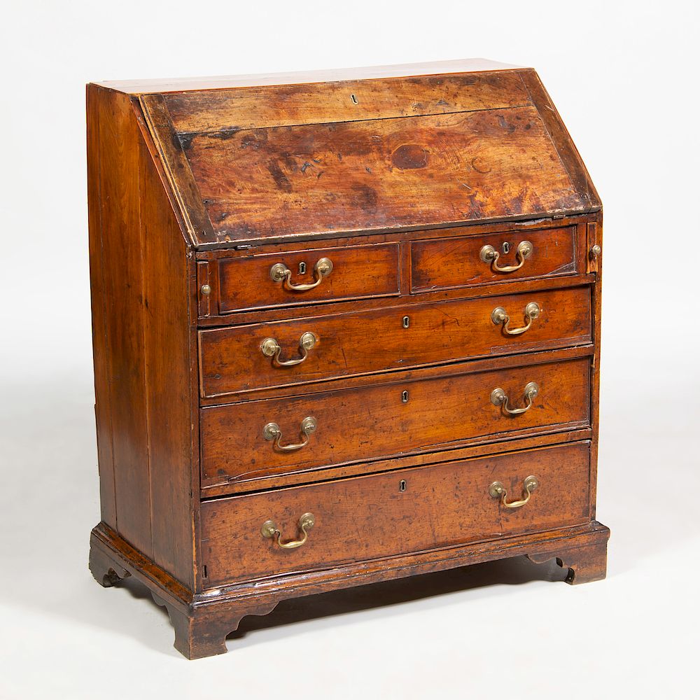 Appraisal: George III Provincial Walnut Slant-Front Desk The slant-front opening to