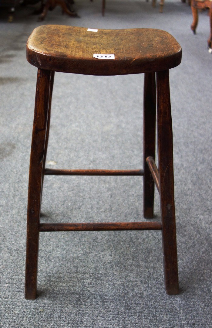 Appraisal: A th century framed low stool on four splayed supports