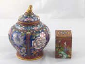 Appraisal: A cloisonne enamelled lobed vase the lid with temple dog