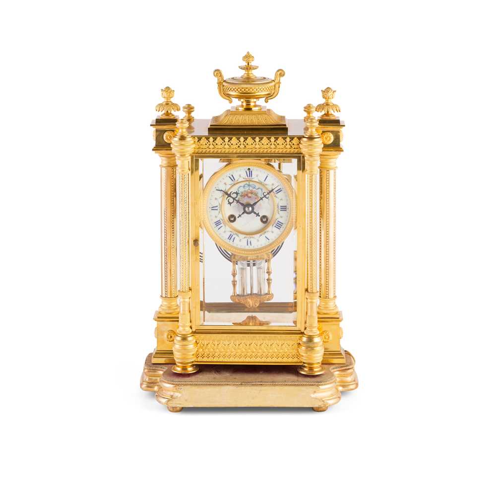 Appraisal: FRENCH GILT METAL MANTEL CLOCK TH CENTURY the four-column glazed