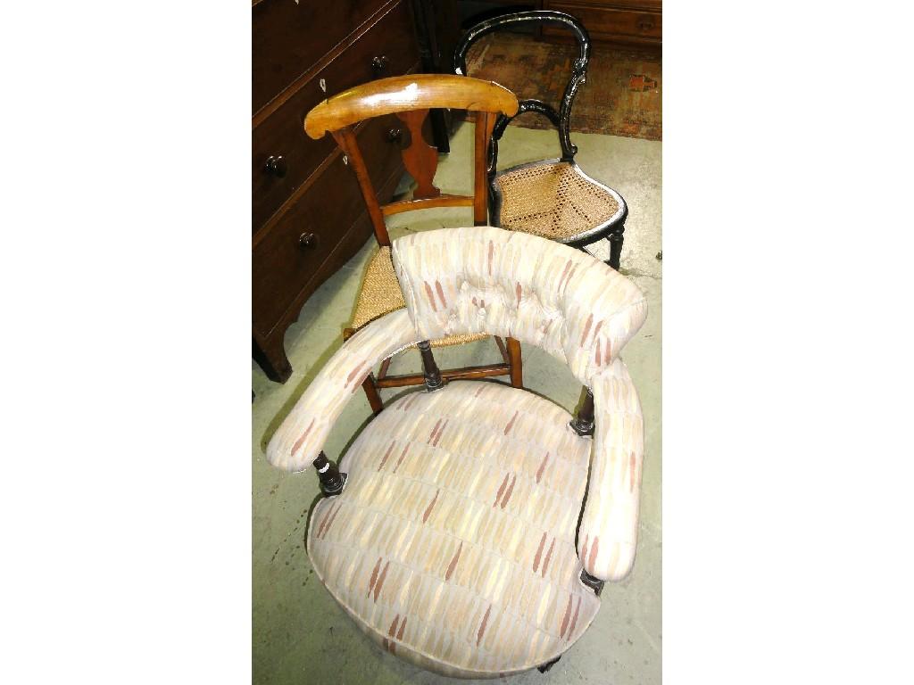 Appraisal: A small Victorian tub chair with circular upholstered seat and