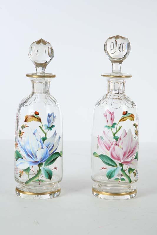 Appraisal: TWO ENAMELED BOTTLES Attributed to Moser Floral and ladybug decoartion