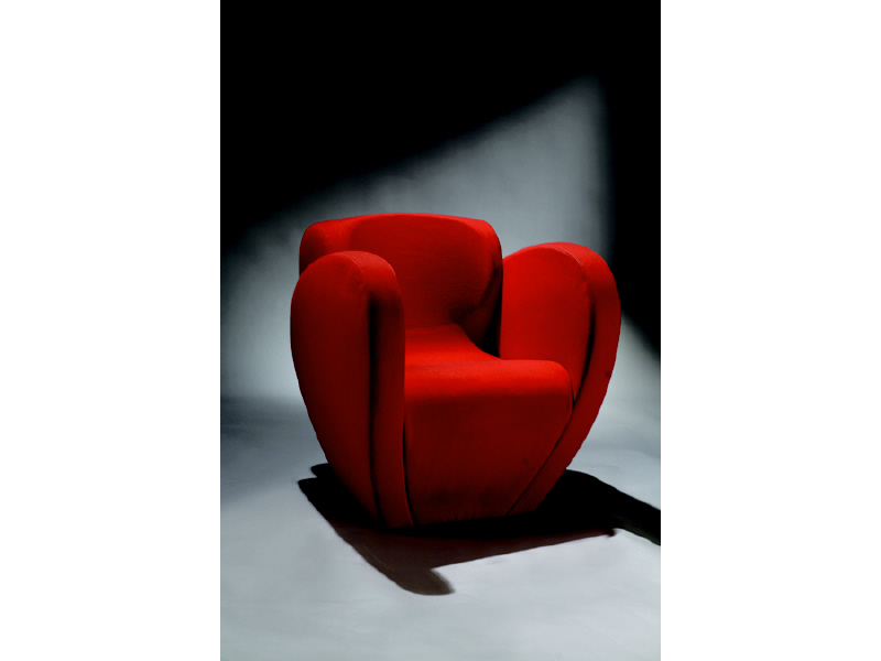 Appraisal: RON ARAD BRITISH B SIZE ARMCHAIR red upholstery over foam