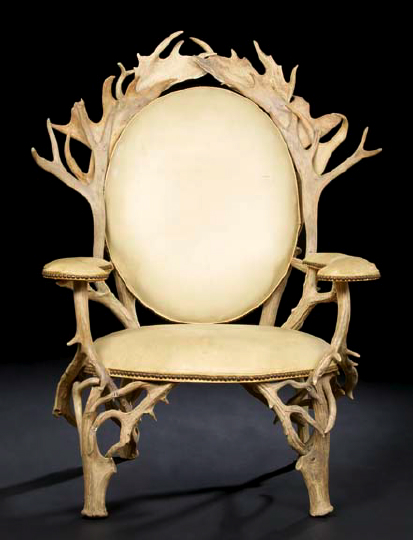 Appraisal: Elaborate Continental Antler Armchair first quarter th century the padded