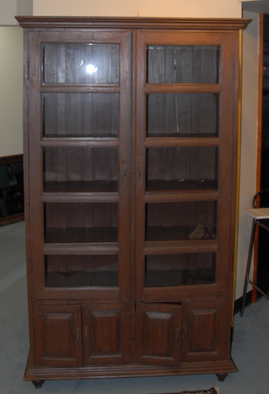 Appraisal: A Teakwood Flat Wall Cupboard having a molded cornice over