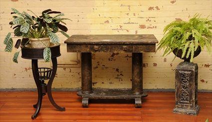 Appraisal: VICTORIAN-STYLE CAST-METAL URN ON PEDESTAL Together with a mahogany plant