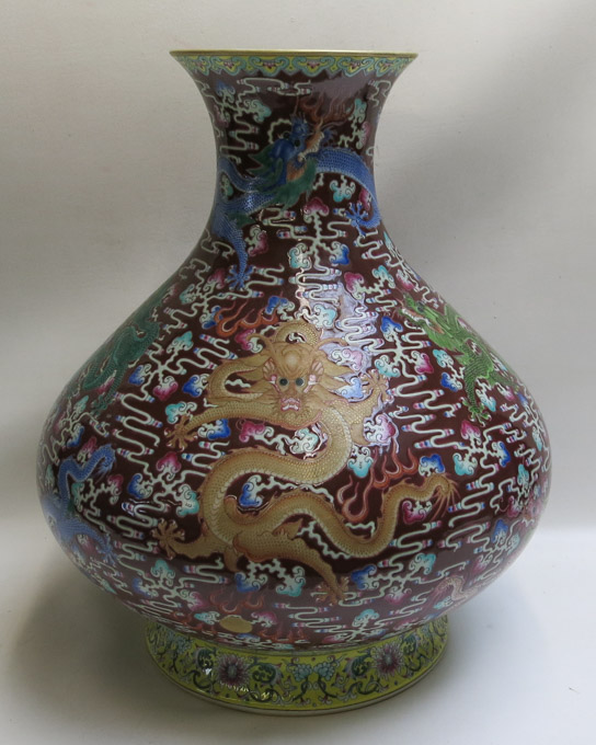 Appraisal: A LARGE CHINESE PORCELAIN NINE DRAGONS VASE the sides featuring