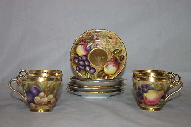 Appraisal: AN AYNSLEY SIX PIECE PAINTED COFFEE SET with fruit designs