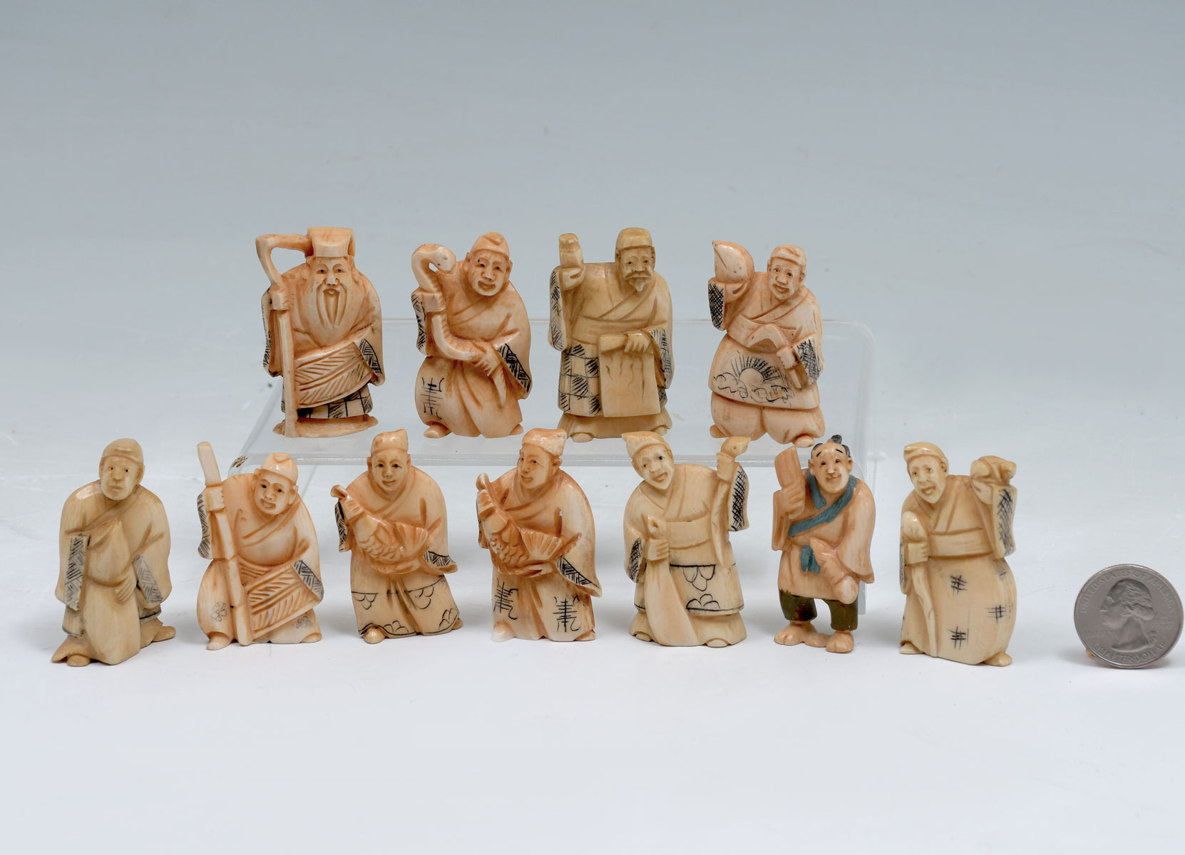 Appraisal: PC JAPANESE FIGURAL CARVED IVORY NETSUKE COLLECTION - Figural carved