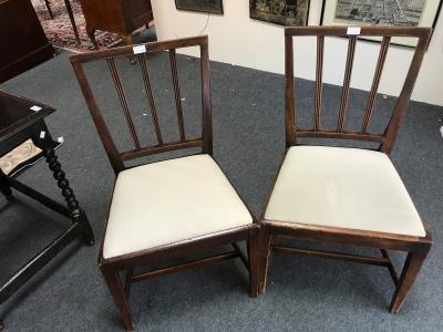 Appraisal: A pair of fruitwood single chairs with upright splats and