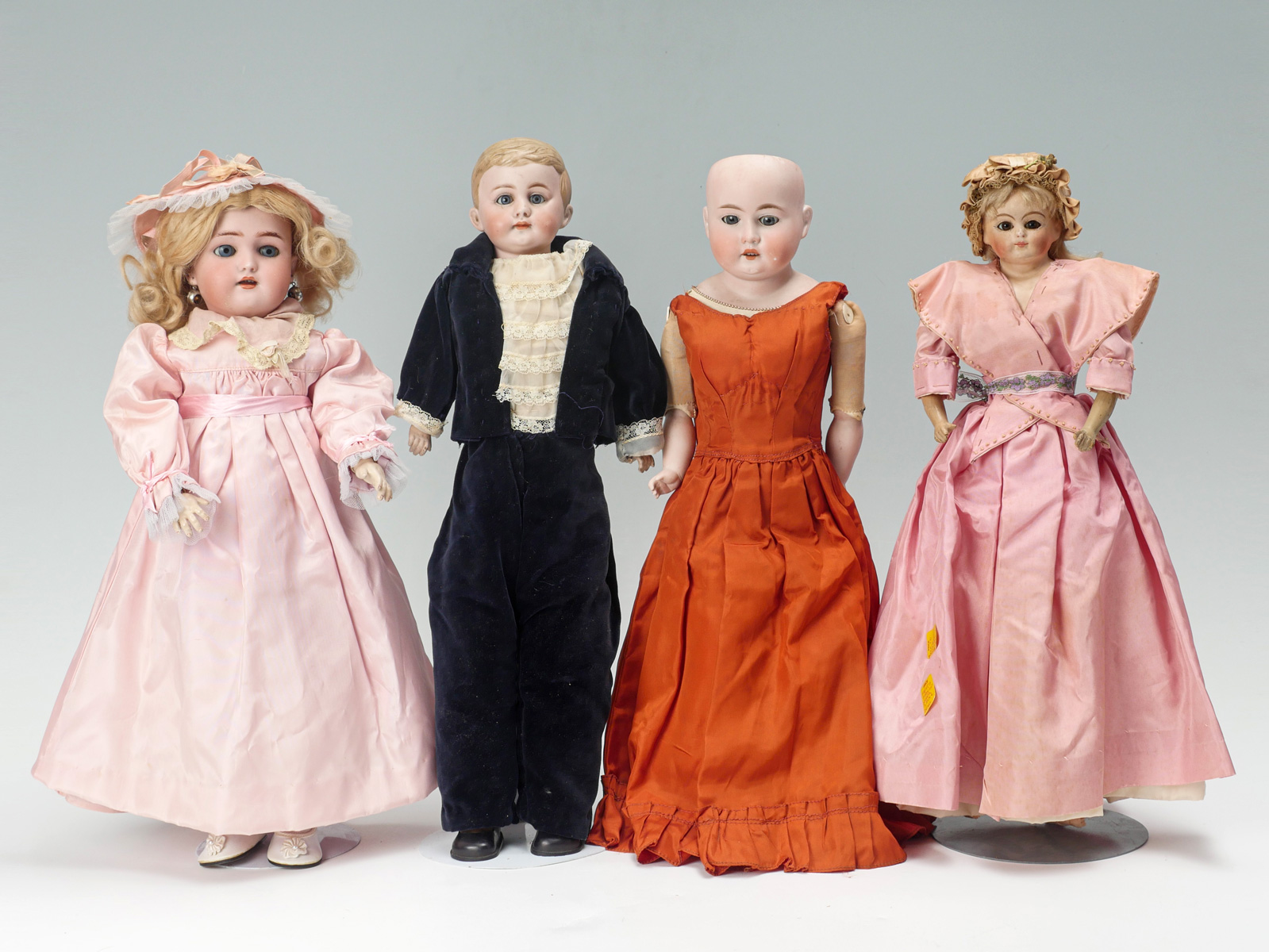 Appraisal: ANTIQUE BISQUE HEAD DOLLS ''h Heinrich Handwerk Simon Halbig Bisque