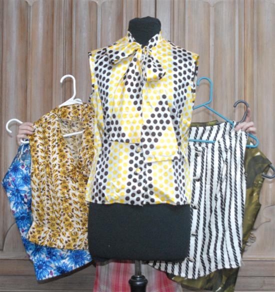 Appraisal: LOT SLEEVELESS PARIS SILK BLOUSES Sizes average ladies -