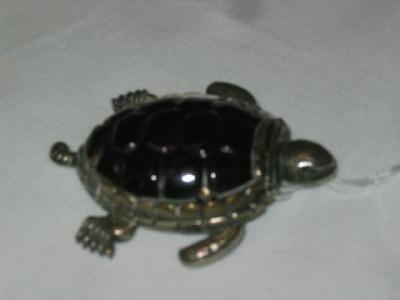 Appraisal: A LATE VICTORIAN VESTA CASE modelled as a turtle with