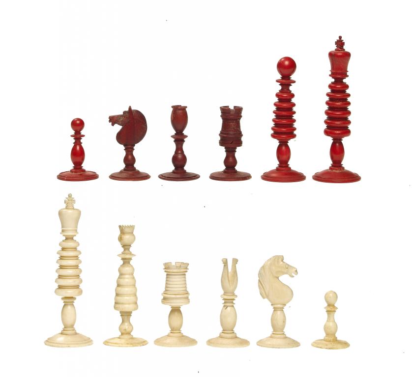 Appraisal: AN ENGLISH IVORY CHESS SET of Barleycorn type stained red