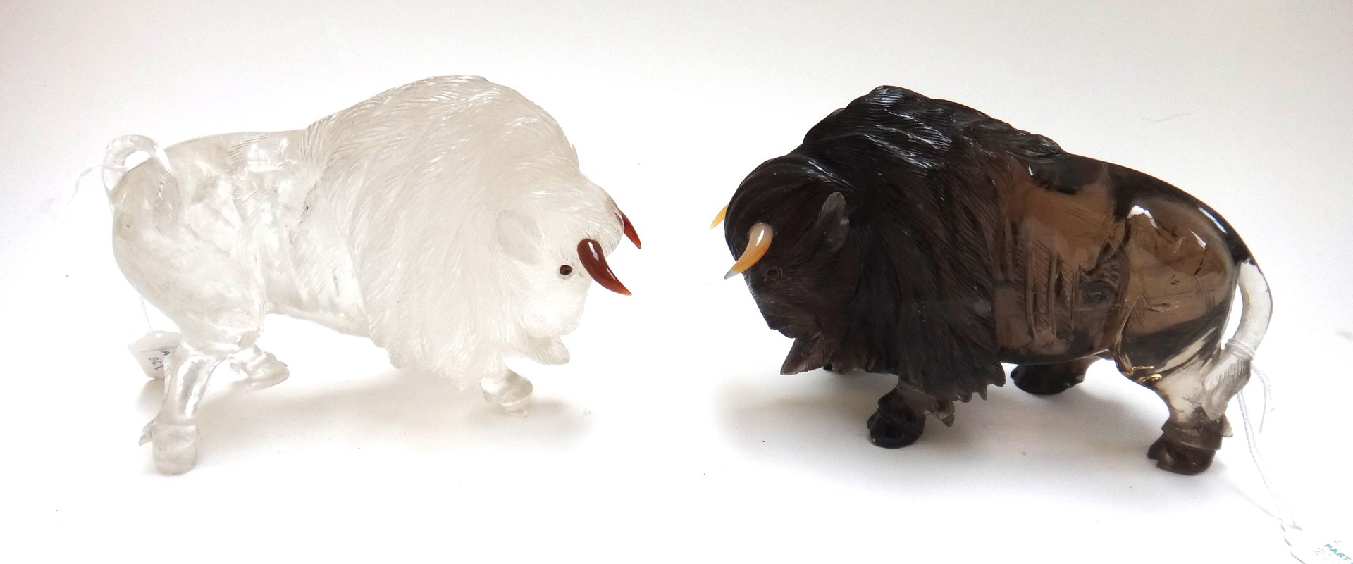 Appraisal: Two carved hardstone Buffalo of Faberg design th century with