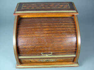 Appraisal: A th century mahogany brass inlaid roll top writing box