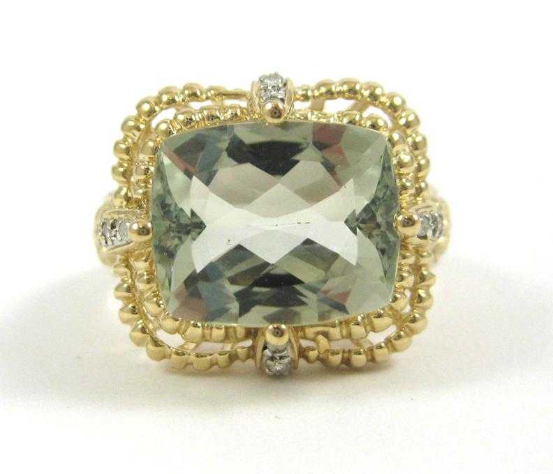 Appraisal: PRASIOLITE AND FOURTEEN KARAT GOLD RING with eight round-cut diamonds