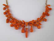 Appraisal: An antique carved coral necklace the corals carved as leaves