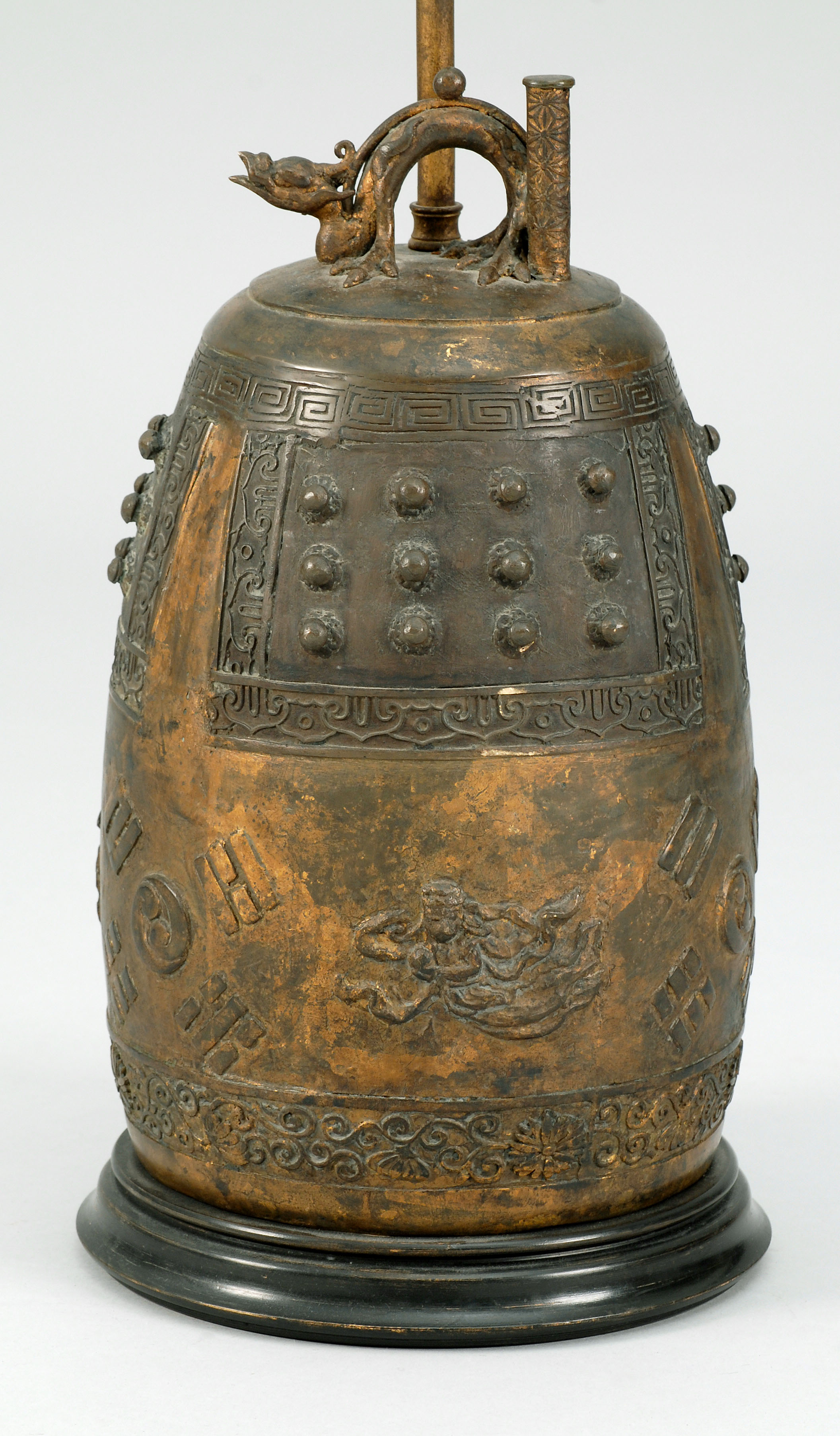 Appraisal: KOREAN BRONZE BELL With trigram and comma design beneath raised