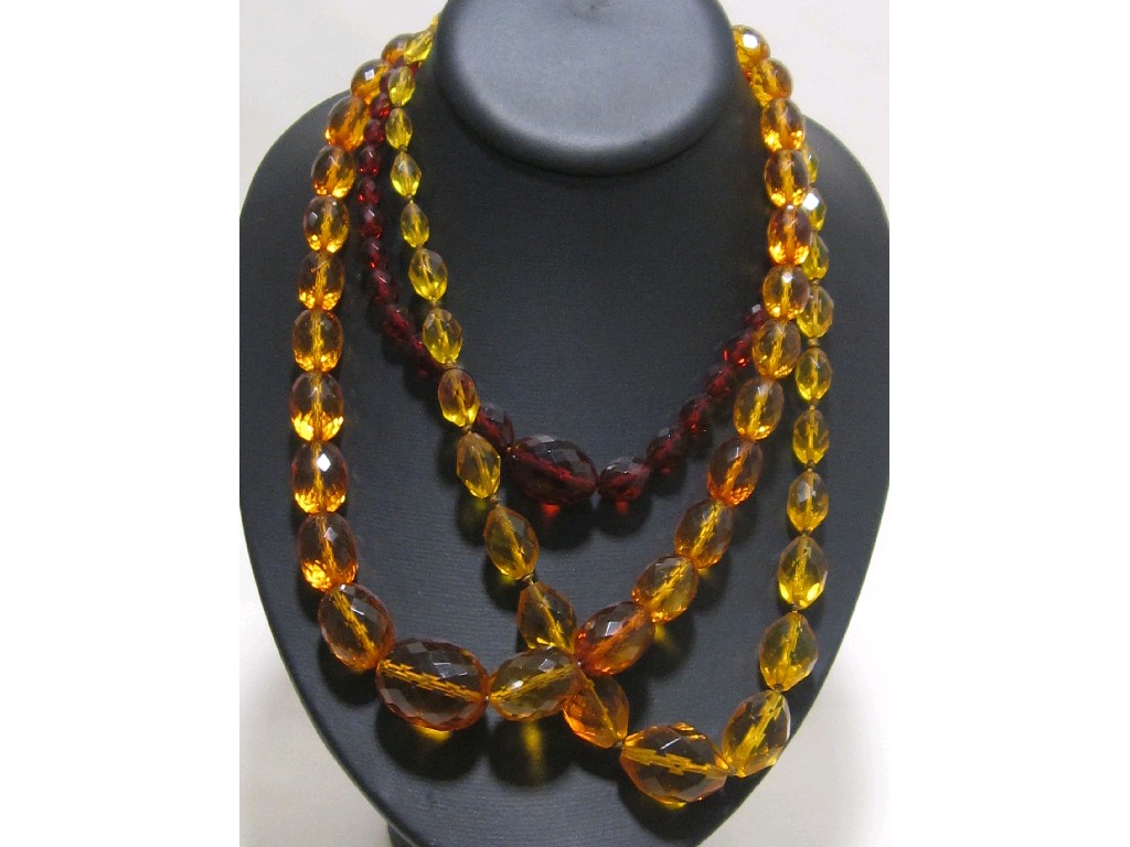 Appraisal: Lot comprising a string of yellow faceted glass beads and