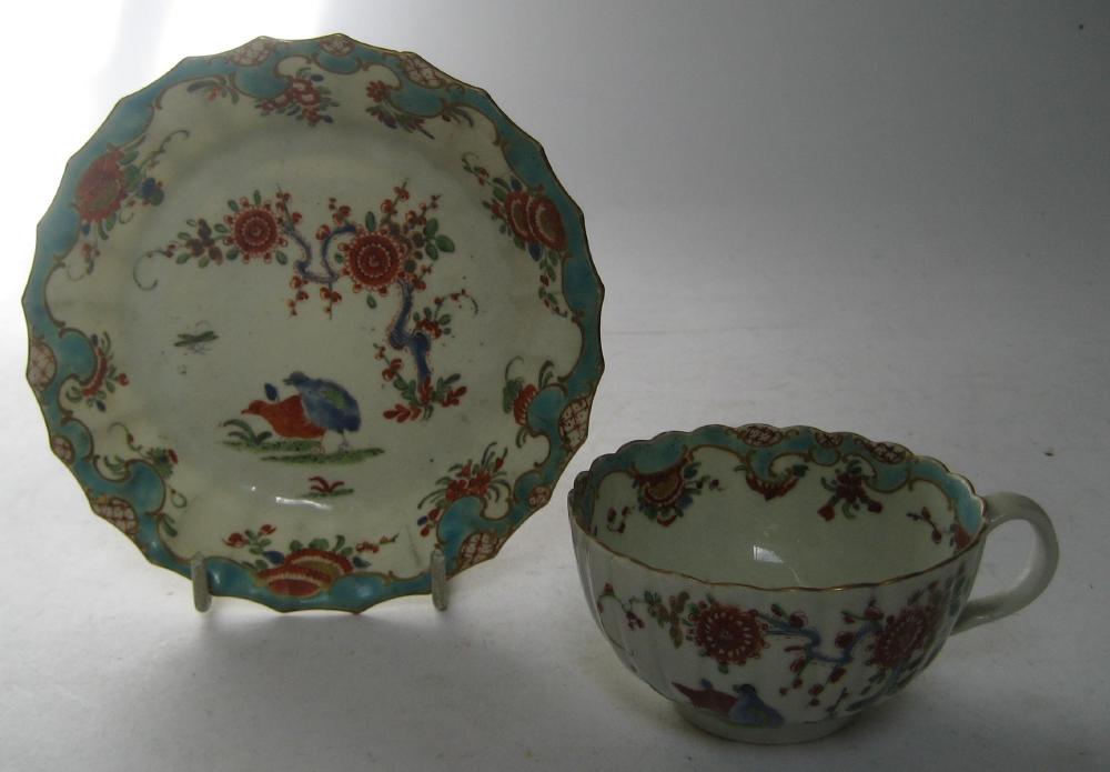 Appraisal: A FIRST PERIOD WORCESTER PORCELAIN TEA CUP AND SAUCER the