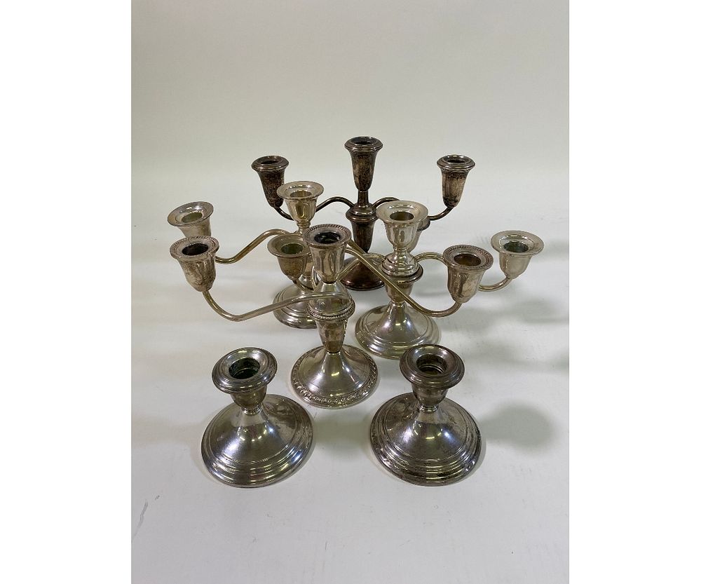 Appraisal: Four Sterling Silver Candelabra Four sterling silver weighted low candelabra