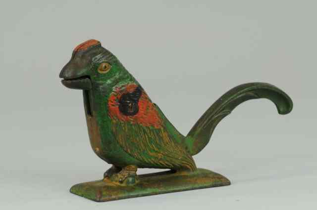 Appraisal: MODERNISTIC PARROT NUTCRACKER Full figured geometrically shaped parrot with extended