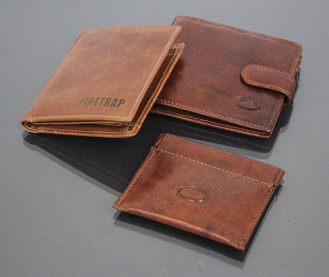 Appraisal: A SMALL LEATHER MONEY POUCH by 'The Bridge' complete with