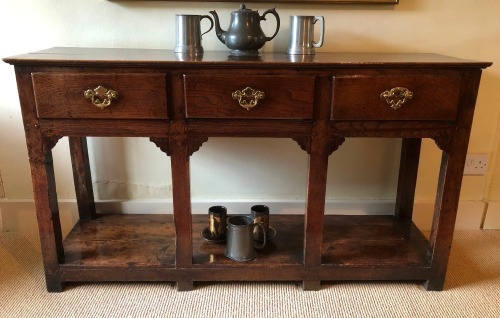 Appraisal: A George II oak dresser base with single plank top